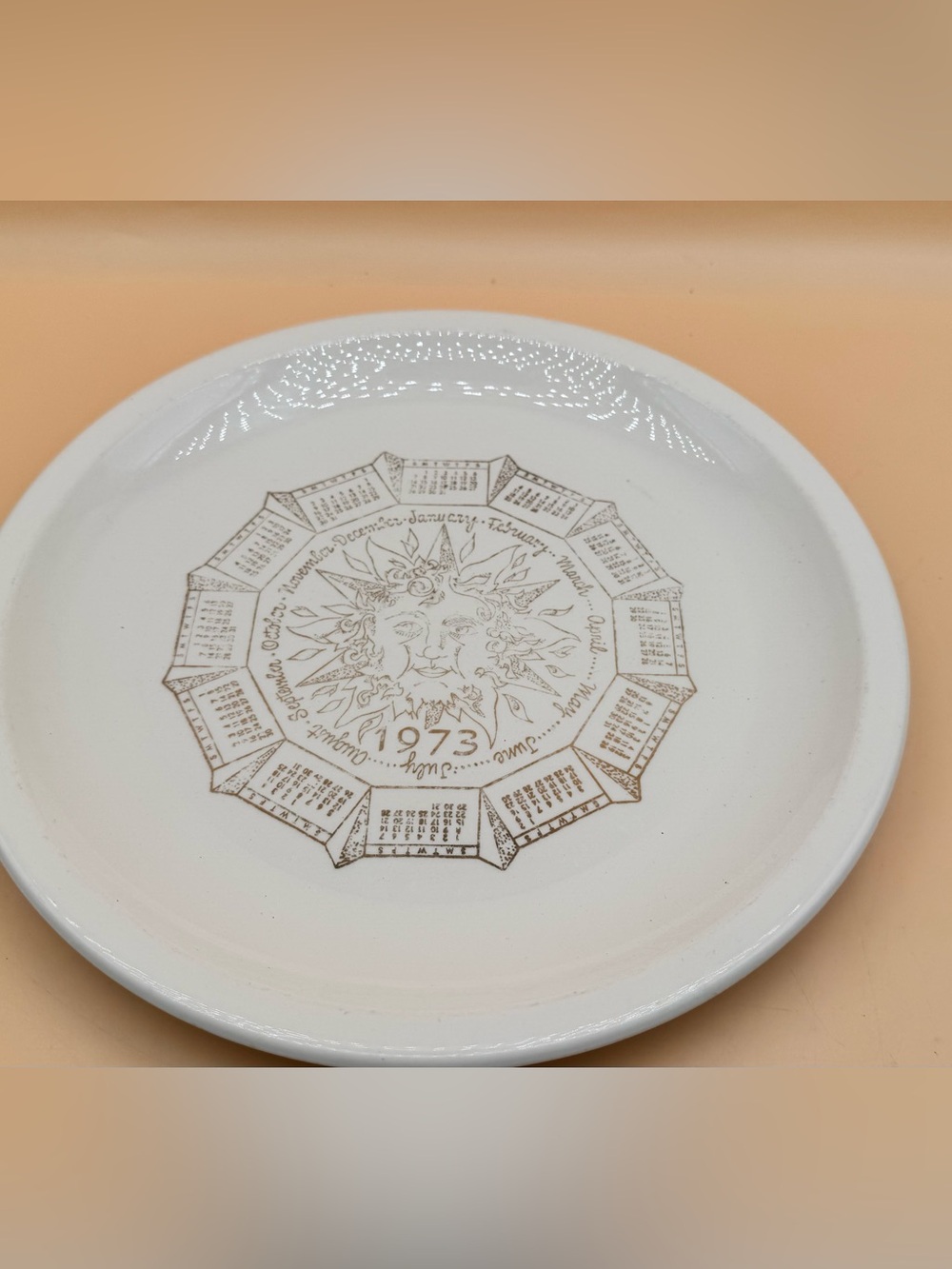 Vintage 1973 Sunface Calendar Decorative Plate - White with Gold Design